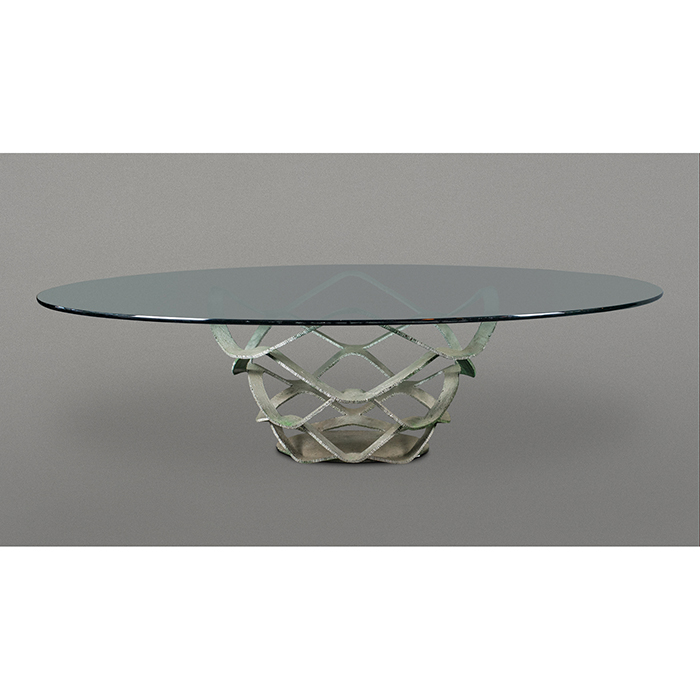 Reflex. Mesa de comedor Neolitica en acero patinado con cubierta oval de vidrio