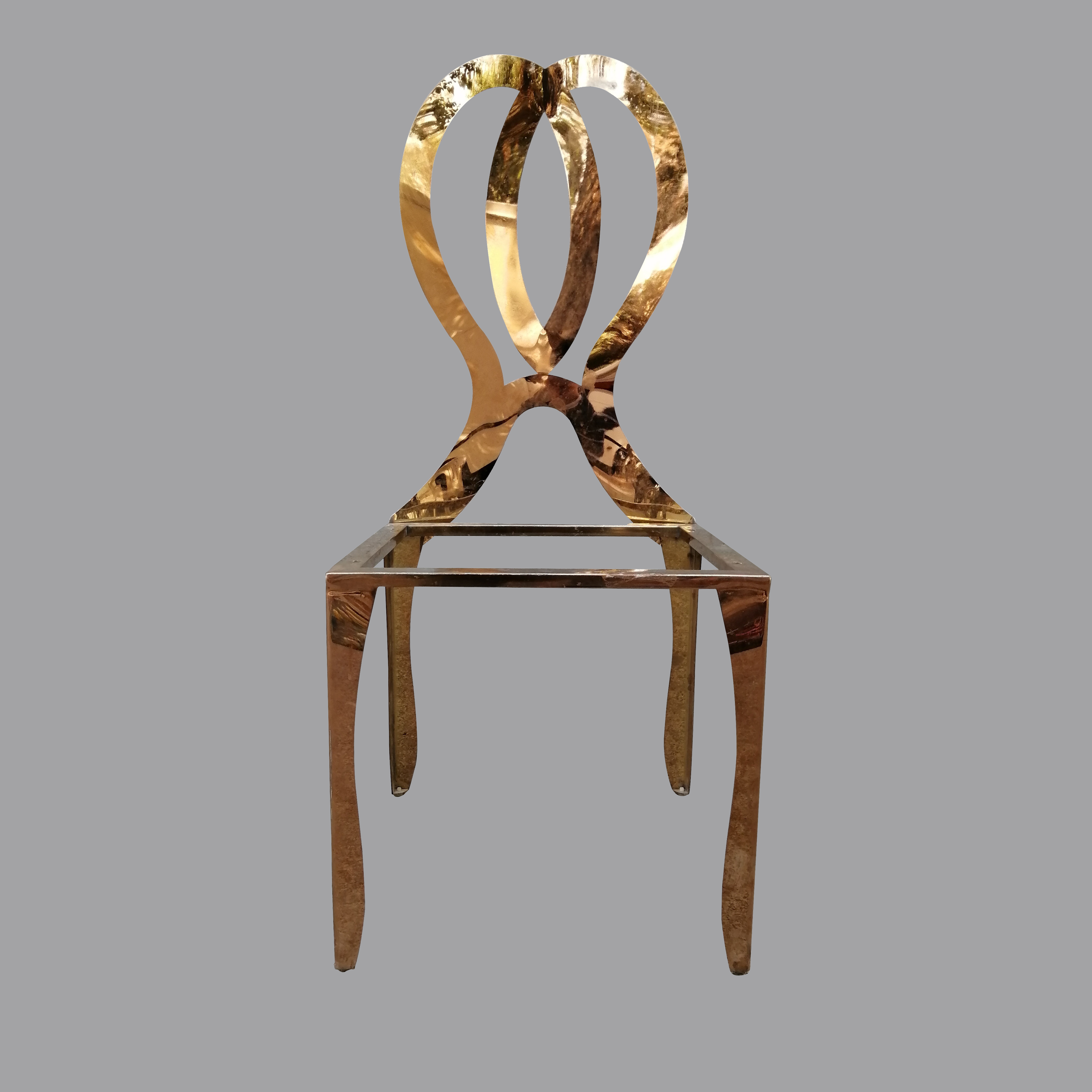 Silla en latón calado y doblado