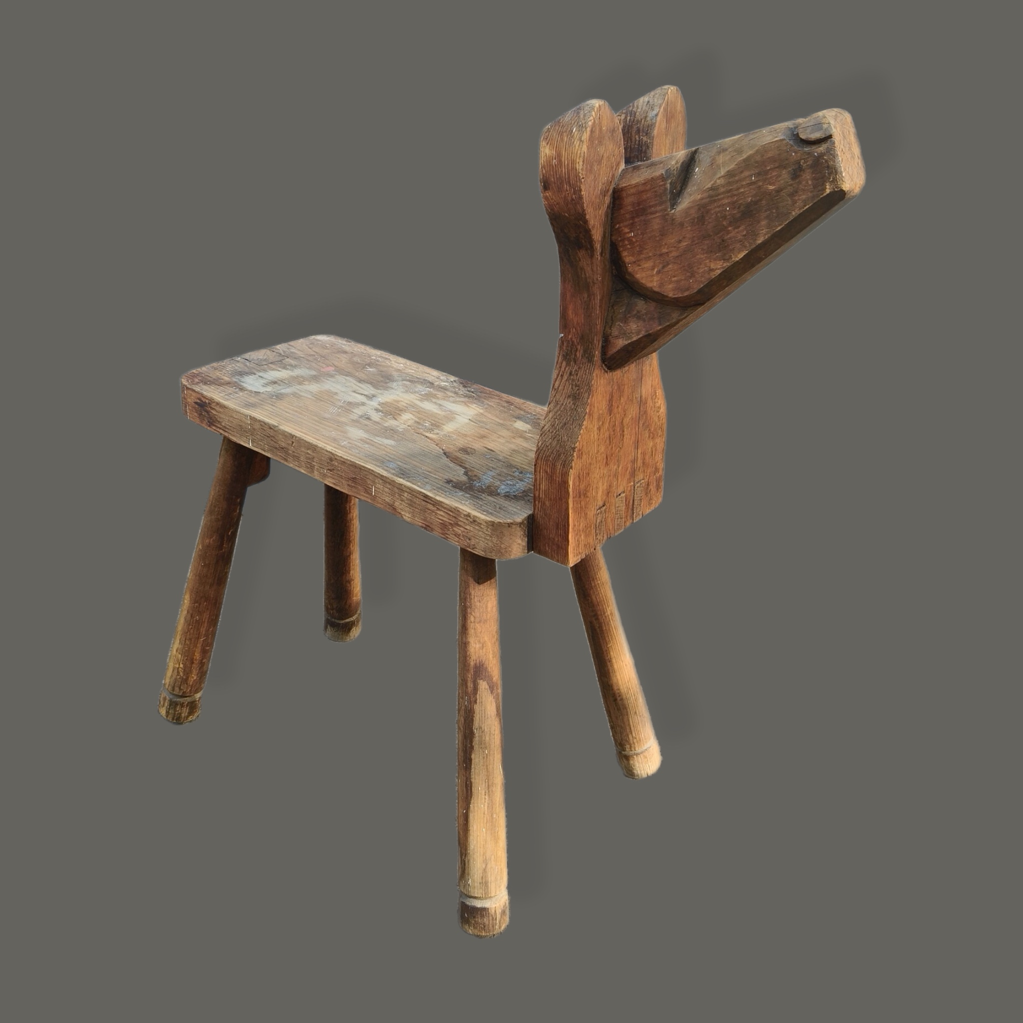 Don S. Shoemaker. Taburete en forma de perro en madera