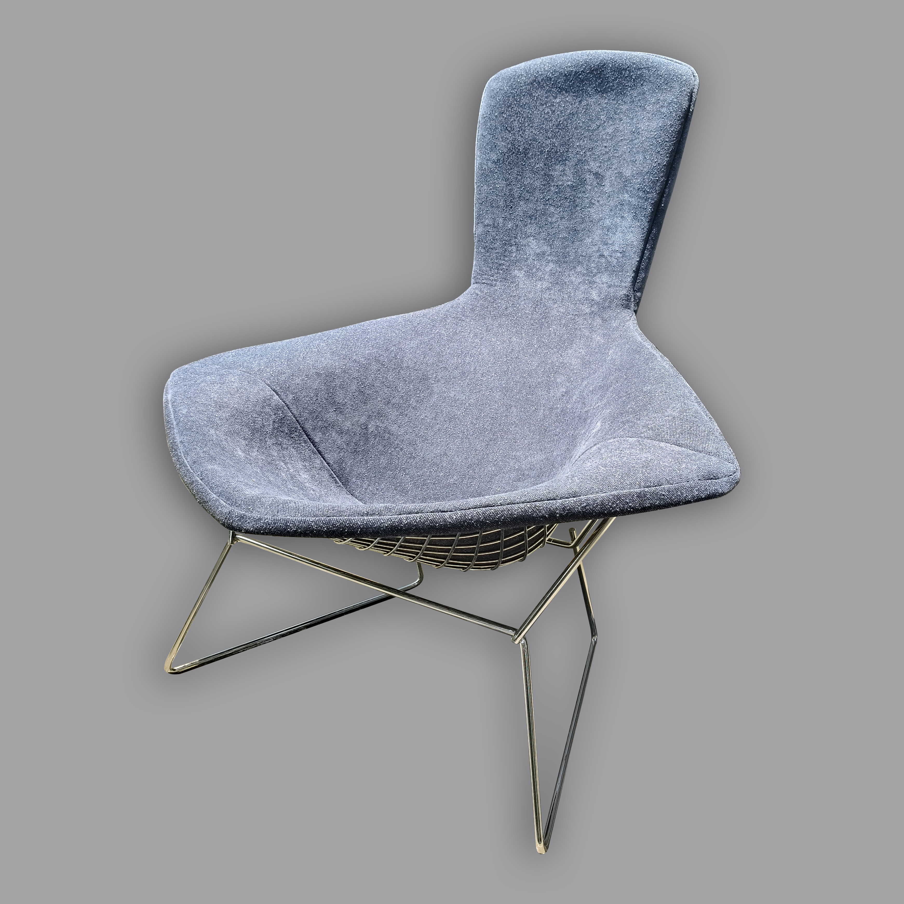 Harry Bertoia para Knoll. Silla Bird en metal cromado y tapicería azul